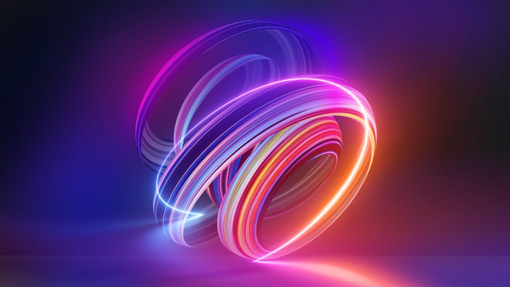 pink and oragnge swirls in an abstract image representing energy in motion