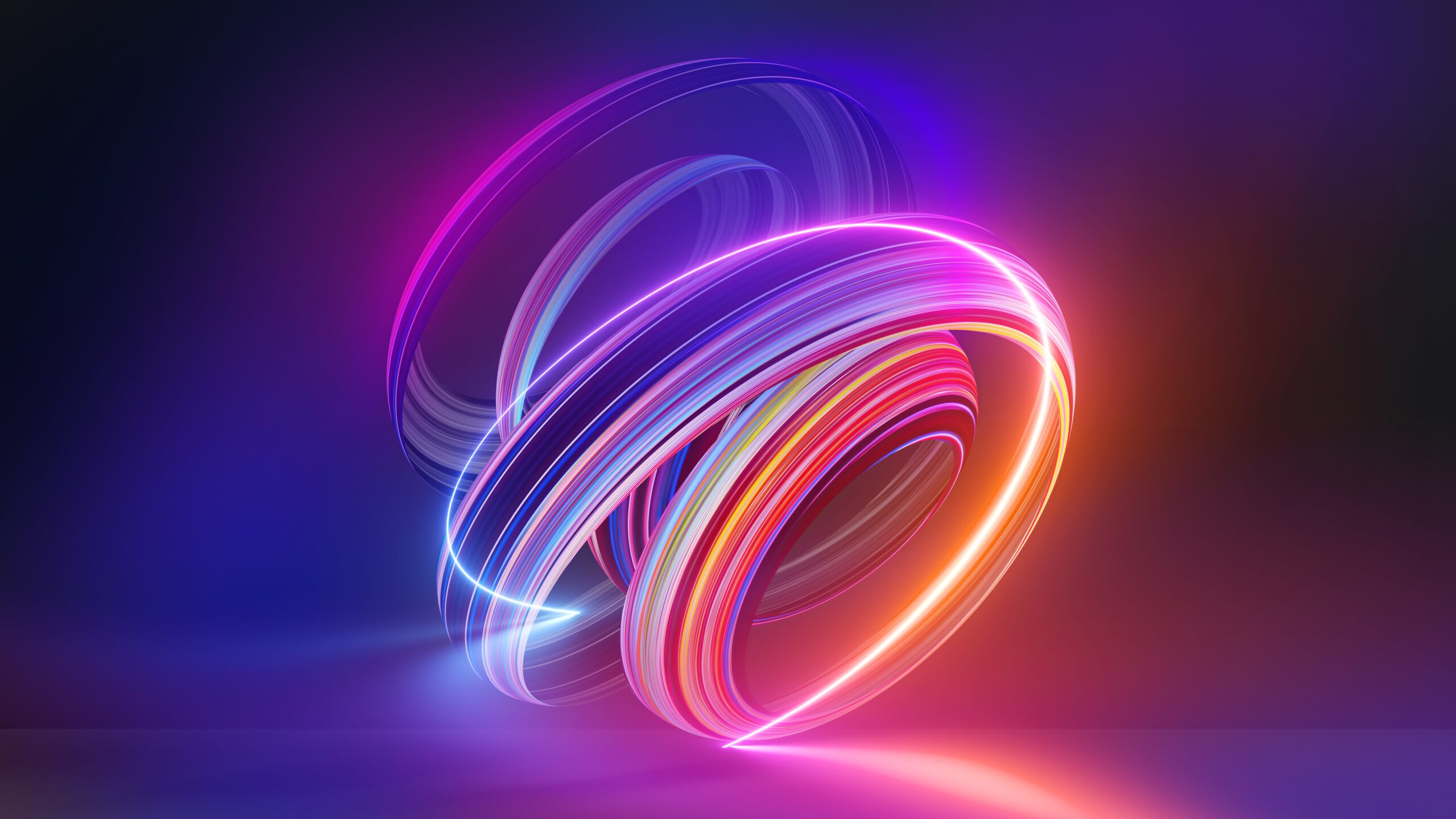 pink and oragnge swirls in an abstract image representing energy in motion