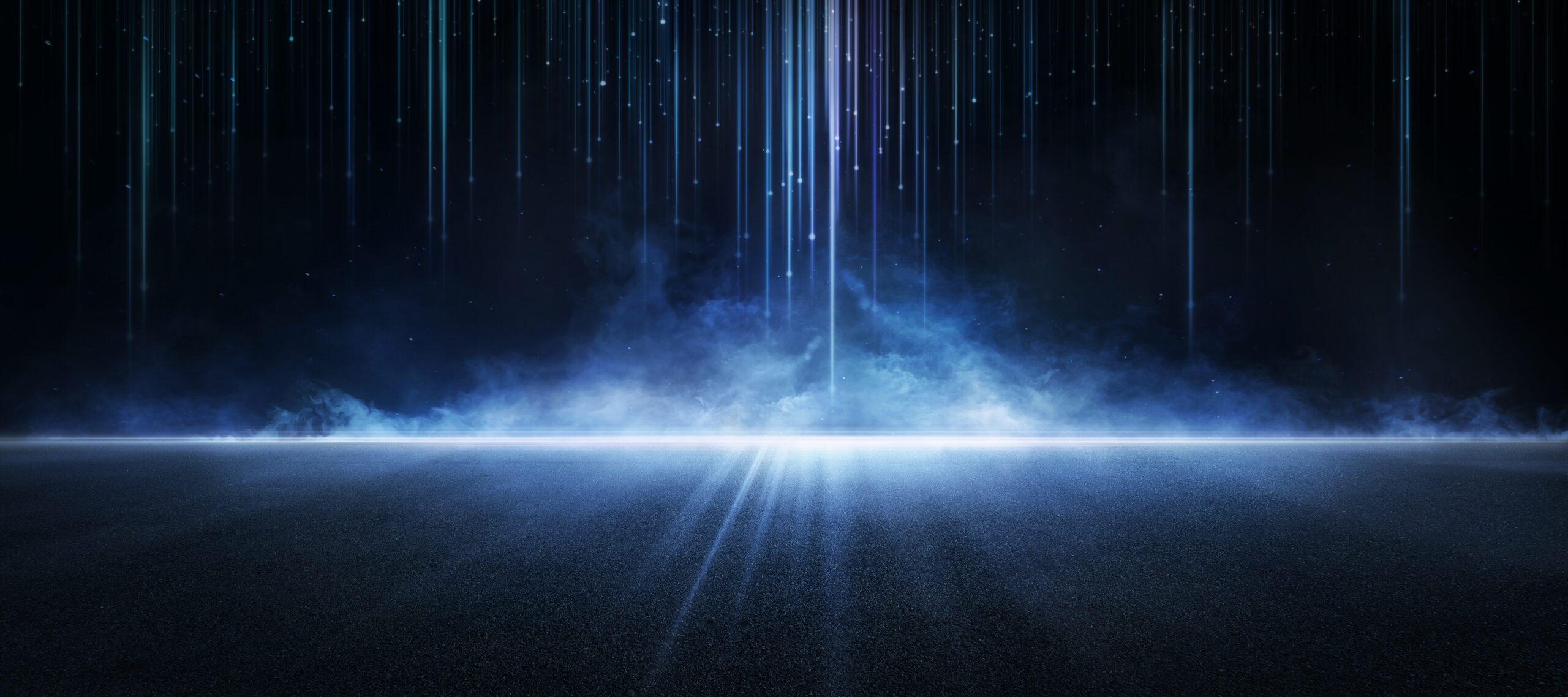 Light blue rays coming down from above against black background representing energy in motion